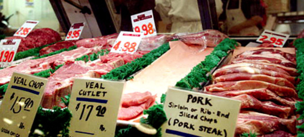 Photo of a supermarket meat display showing how green is used between meat to make it look more red